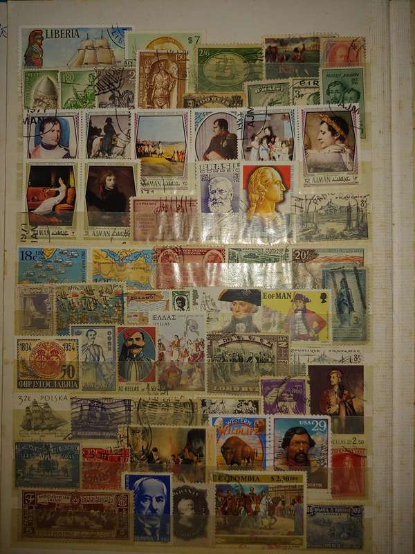 USED A4 STOCKBOOK 16/32 PAGES LOADED WITH WORLD STAMPS WRITING ON PAGES STAMPS GOOD VALUE