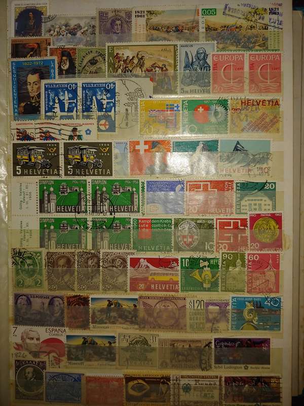 USED A4 STOCKBOOK 16/32 PAGES LOADED WITH WORLD STAMPS WRITING ON PAGES STAMPS GOOD VALUE