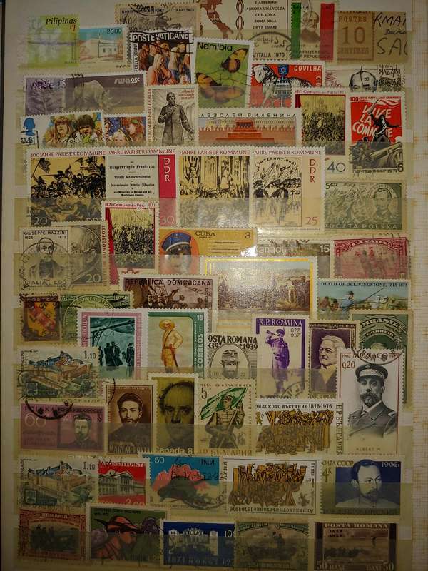 USED A4 STOCKBOOK 16/32 PAGES LOADED WITH WORLD STAMPS WRITING ON PAGES STAMPS GOOD VALUE