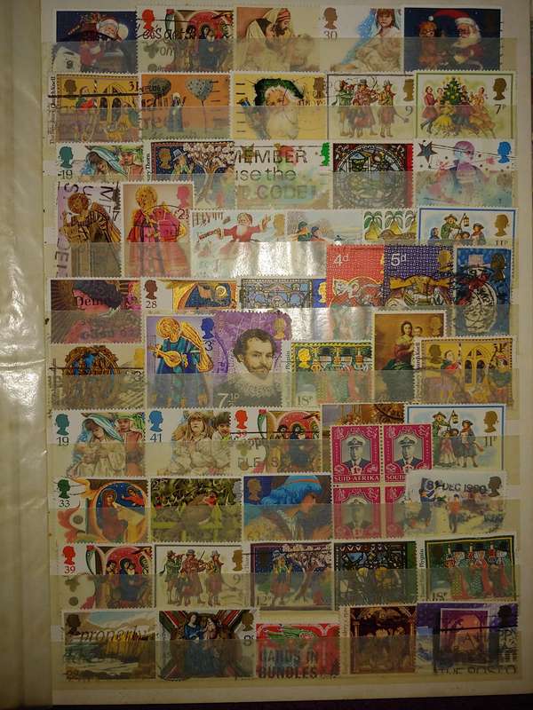 USED A4 STOCKBOOK 16/32 PAGES LOADED WITH WORLD STAMPS WRITING ON PAGES STAMPS GOOD VALUE