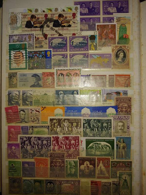 USED A4 STOCKBOOK 16/32 PAGES LOADED WITH WORLD STAMPS WRITING ON PAGES STAMPS GOOD VALUE
