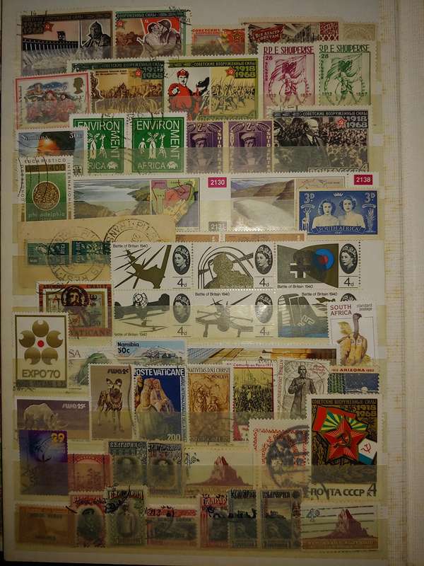 USED A4 STOCKBOOK 16/32 PAGES LOADED WITH WORLD STAMPS WRITING ON PAGES STAMPS GOOD VALUE
