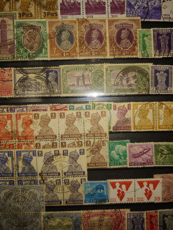 A5 STOCKBOOK LOADED WITH STAMPS AS PER IMAGES 4/8 PAGES