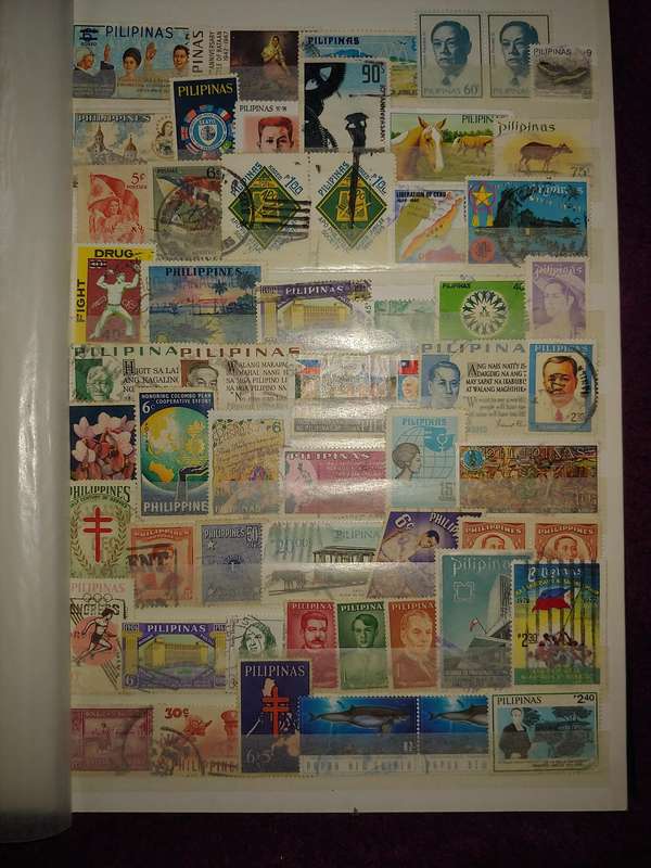 USED A4 STOCKBOOK 11/22 PAGES LOADED WITH WORLD STAMPS GOOD VALUE