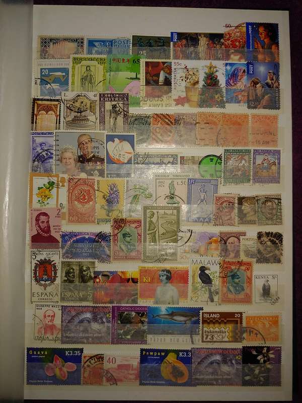 USED A4 STOCKBOOK 11/22 PAGES LOADED WITH WORLD STAMPS GOOD VALUE