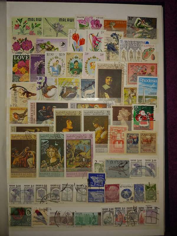 USED A4 STOCKBOOK 11/22 PAGES LOADED WITH WORLD STAMPS GOOD VALUE