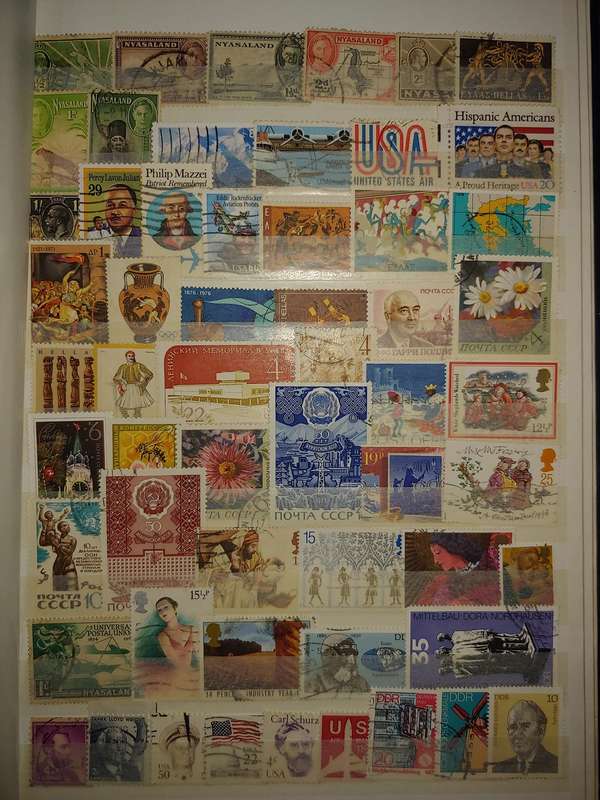 USED A4 STOCKBOOK 11/22 PAGES LOADED WITH WORLD STAMPS GOOD VALUE