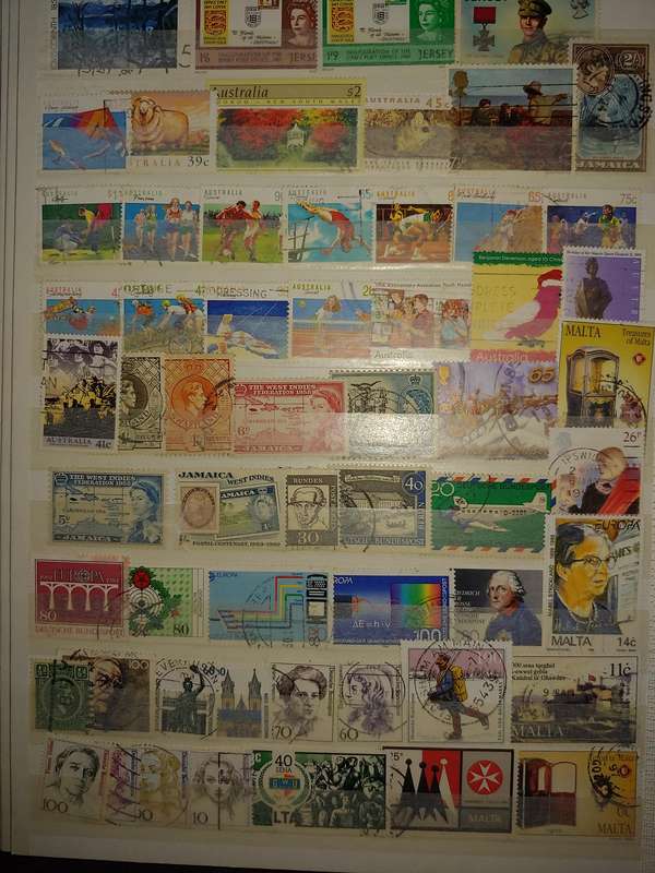 USED A4 STOCKBOOK 11/22 PAGES LOADED WITH WORLD STAMPS GOOD VALUE