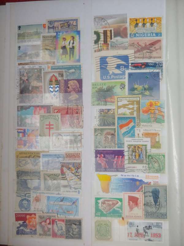 USED A4 DAVO STOCKBOOK FULLI LOADED WITH WORLD STAMPS 8/16 PAGES