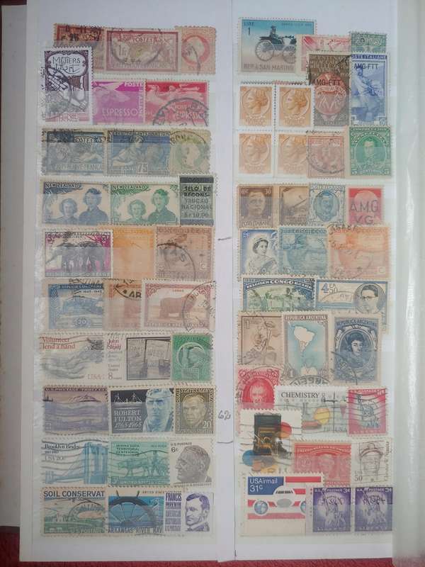 USED A4 DAVO STOCKBOOK FULLI LOADED WITH WORLD STAMPS 8/16 PAGES