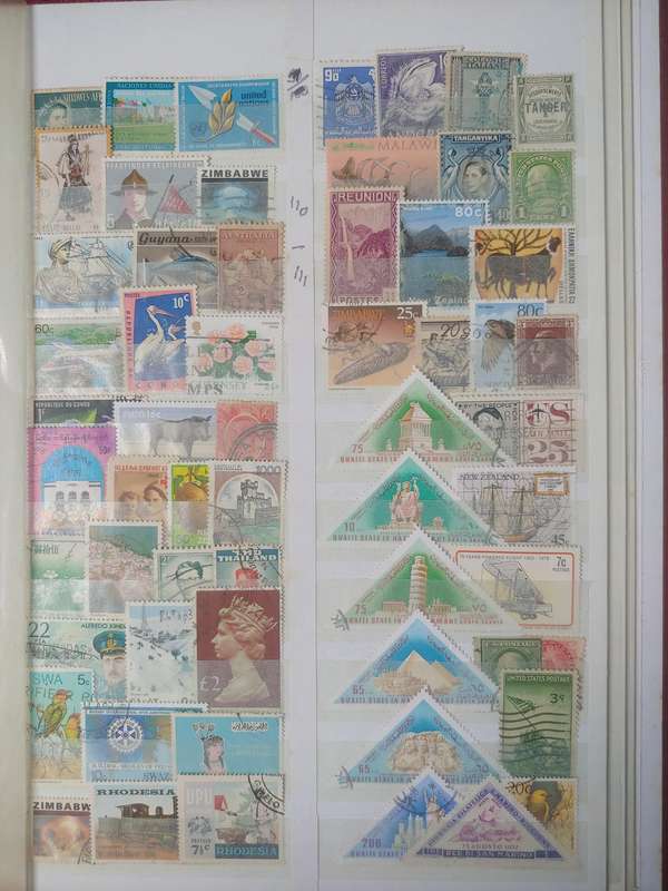 USED A4 DAVO STOCKBOOK FULLI LOADED WITH WORLD STAMPS 8/16 PAGES