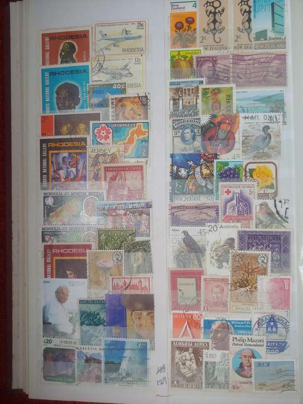 USED A4 DAVO STOCKBOOK FULLI LOADED WITH WORLD STAMPS 8/16 PAGES