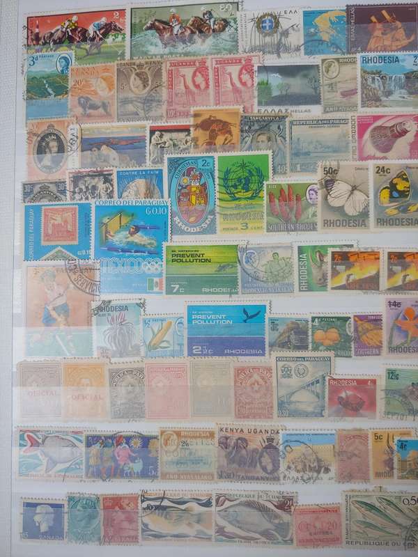 USED A4 LIGHTHOUSE STOCKBOOK LOADED WITH WORLD STAMPS 16/32 PAGES