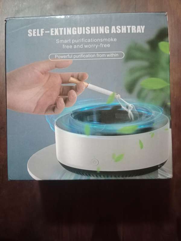 Self extinguish ashtray
