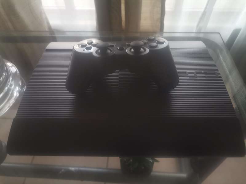 Playstation 3 Super slim 250GB 1 Control All Cables 24 Games on Harddrive Game list in the List