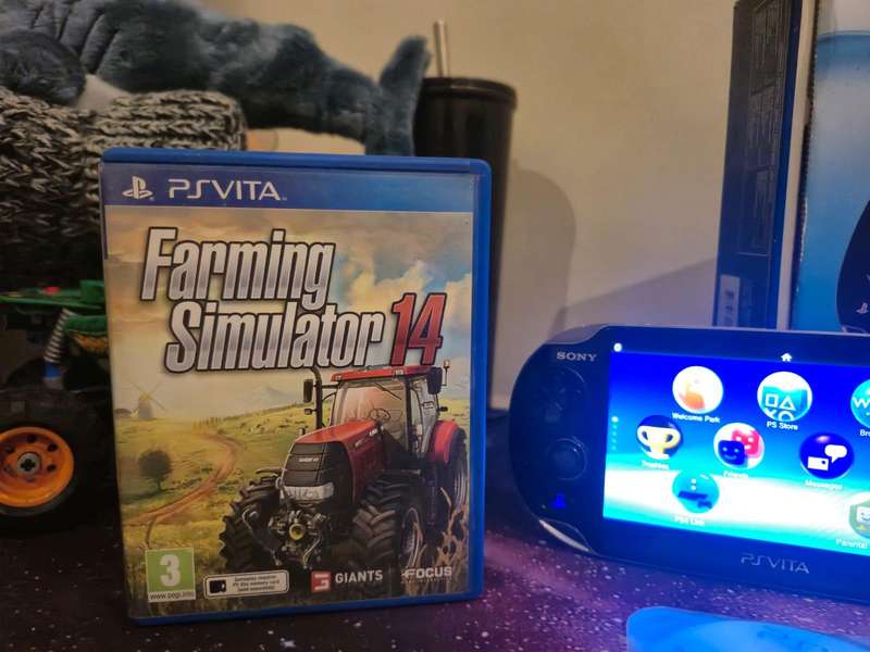 PS Vita OLED 1000 Model  Original Packaging + 3 Games + 16GB Memory Card (Pre-owned)