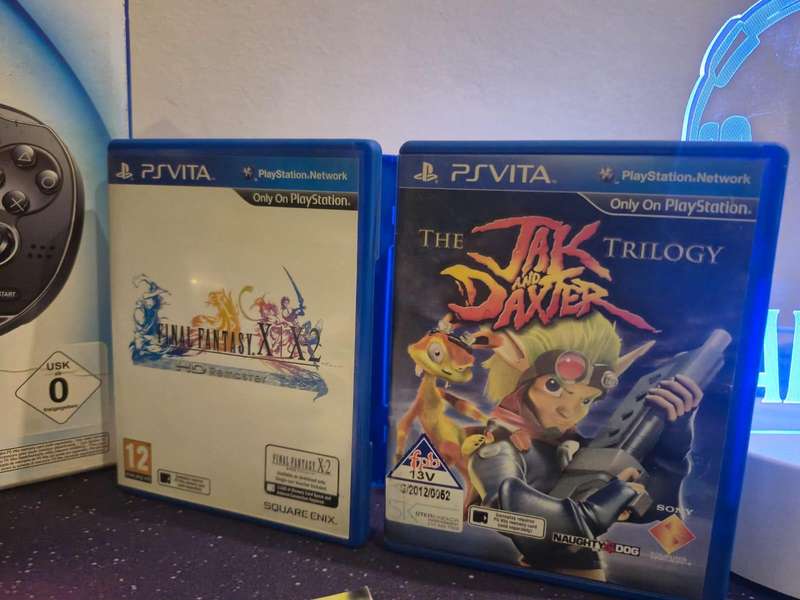 PS Vita OLED 1000 Model  Original Packaging + 3 Games + 16GB Memory Card (Pre-owned)