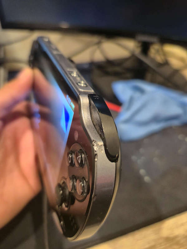 PS Vita OLED 1000 Model  Original Packaging + 3 Games + 16GB Memory Card (Pre-owned)