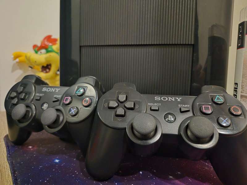 PS3 12GB Super Console, 2 Original Controllers, 2 Games (Pre-owned)