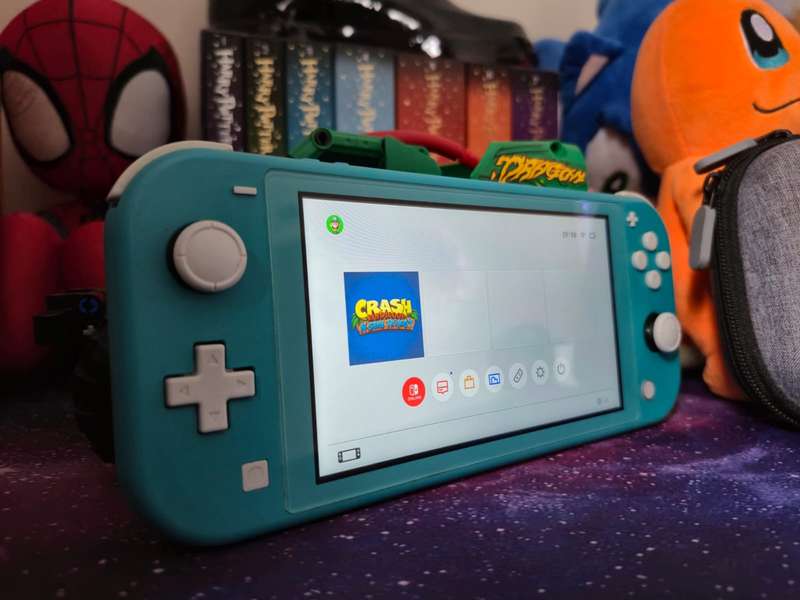 Nintendo Switch Lite 32GB + 64GB SD Card + 1 Game (Pre-owned)