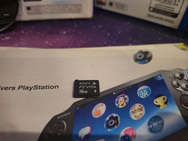PS Vita OLED 1000 Model  Original Packaging + 3 Games + 16GB Memory Card (Pre-owned)