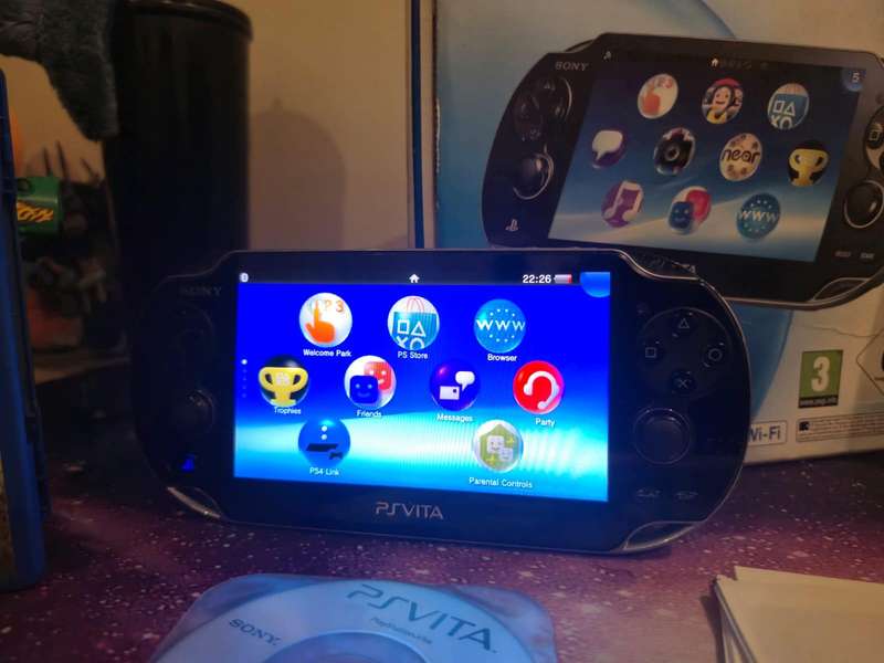 PS Vita OLED 1000 Model  Original Packaging + 3 Games + 16GB Memory Card (Pre-owned)