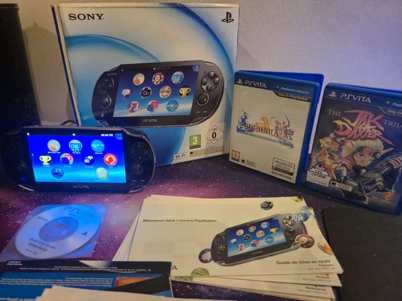 PS Vita OLED 1000 Model  Original Packaging + 3 Games + 16GB Memory Card (Pre-owned)
