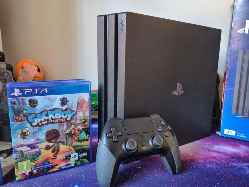 PS4 PRO 1TB Slim,  Sweg Gadget Controller, 2 Games, Original Packaging (Pre-owned)