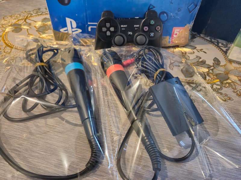 PS3 500GB Super Slim, Sing Star Kit, Many Games (Pre-owned)