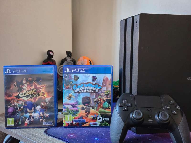 PS4 PRO 1TB Slim,  Sweg Gadget Controller, 2 Games, Original Packaging (Pre-owned)