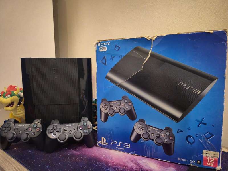 PS3 12GB Super Console, 2 Original Controllers, 2 Games (Pre-owned)