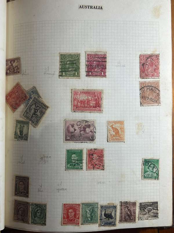 Worldwide Stamp Collection Album - 200+ hinged and used stamps. relatively full