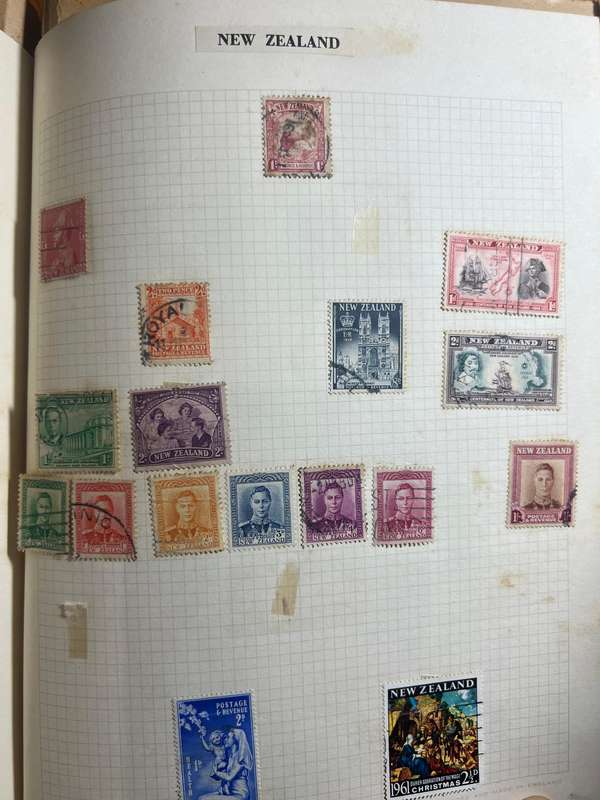 Worldwide Stamp Collection Album - 200+ hinged and used stamps. relatively full