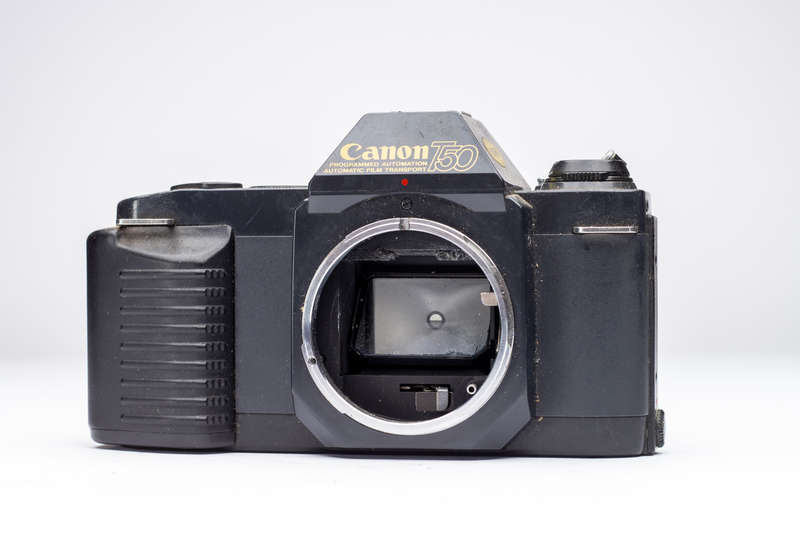 Canon T50 35mm SLR Film Camera (No lens, No Cover)