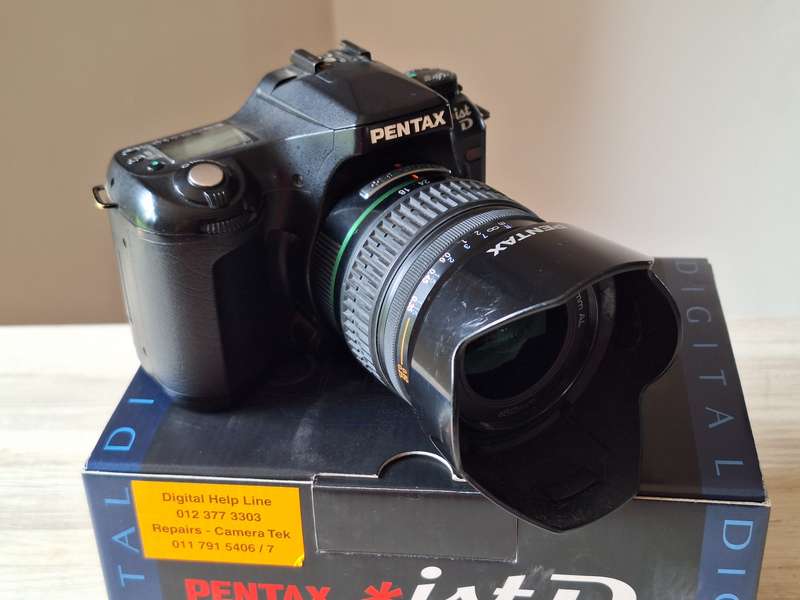 Pentax *ist D digital camera with lens