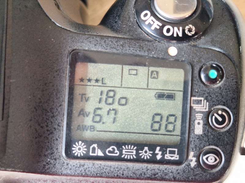 Pentax *ist D digital camera with lens