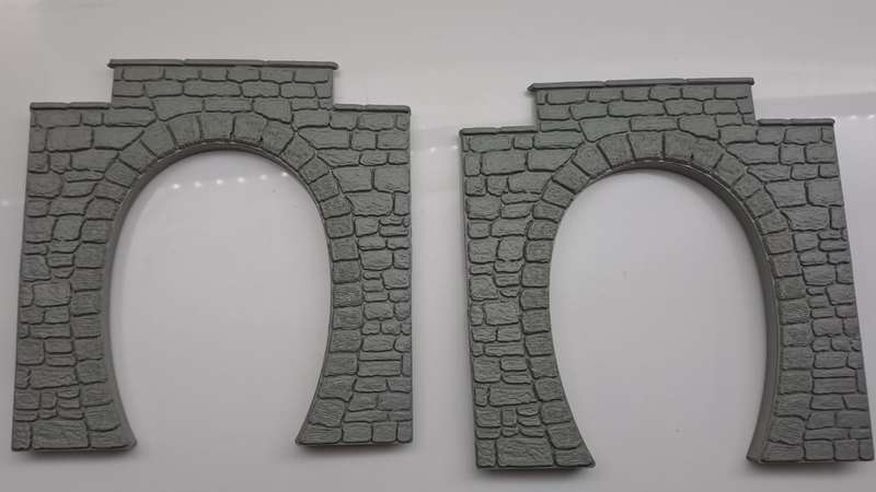 Model Trains HO-Scale 1 x Bag with two plastic single tunnel entrances.