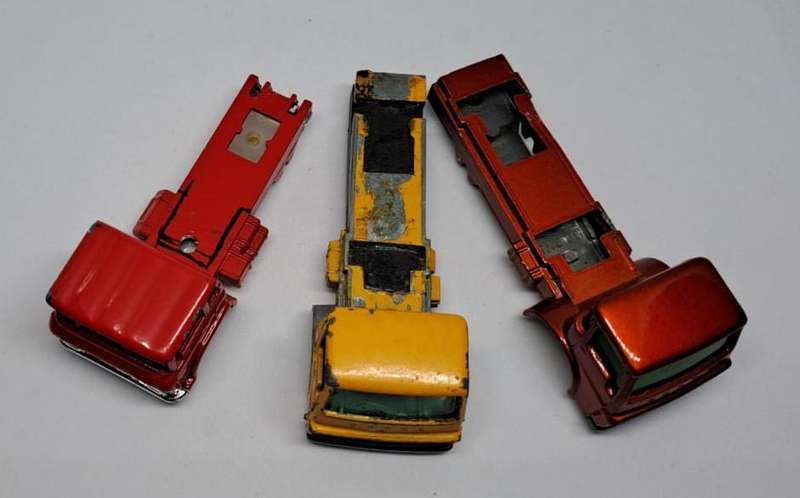 Model Trains HO 3 x Trucks selling as scrap, no wheels on. 2 x Matchbox & 1 x Yatming.