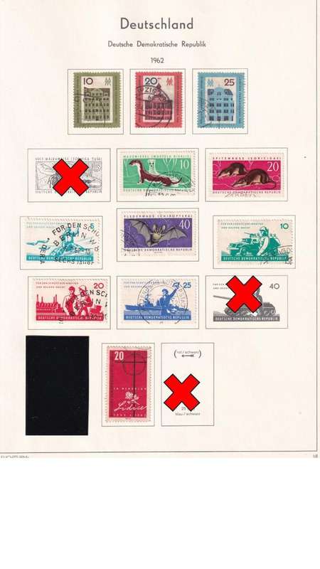 Used Germany DDR stamps on album page. 1 bid for all. Red cross stamps not available.