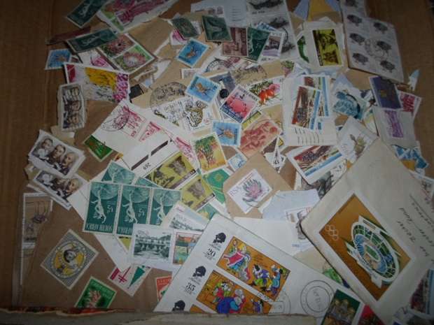 1000 PLUS RSA USED STAMPS ON PAPER SEE PICS