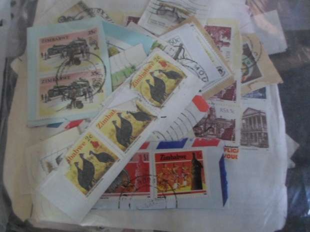 380 MIXED WORLD USED STAMPS ON PAPER NEAT LOT SEE PICS