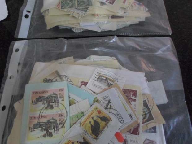 380 MIXED WORLD USED STAMPS ON PAPER NEAT LOT SEE PICS
