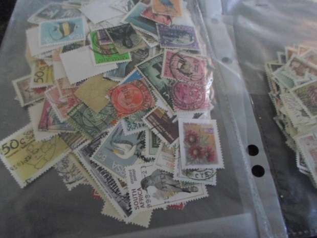 1190 X MIXED WORLD  USED STAMPS OFF PAPER SEE PICS