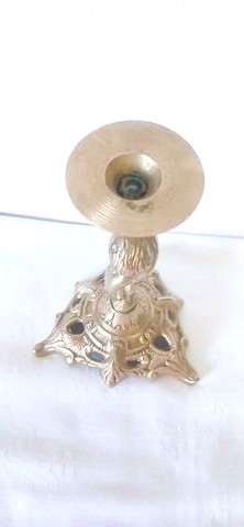 Vintage brass cherub candle holder