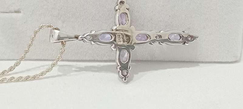 Sterling silvercross with purple cubic stones