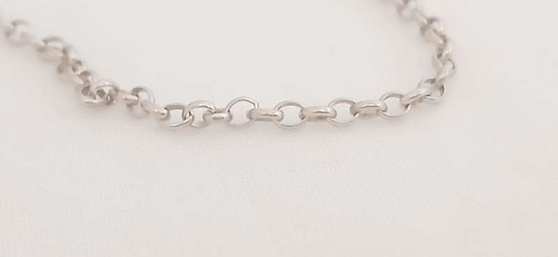 Sterling silver pendant with brass chime on chain