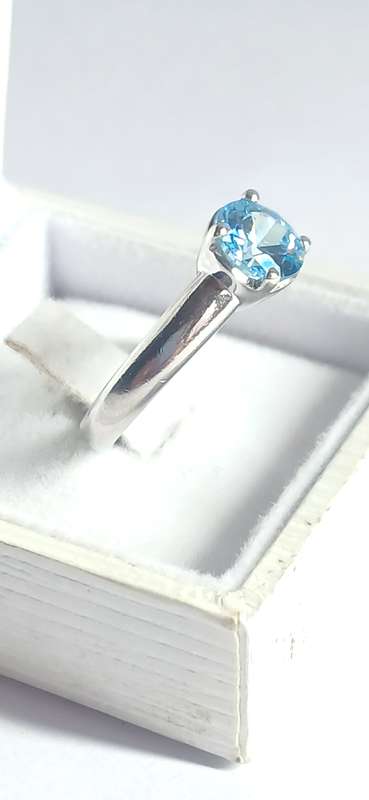 Sterling silver ring with blue zirconia