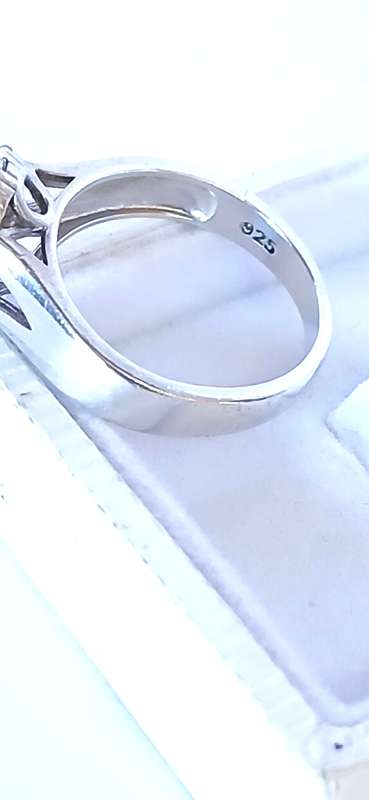 Sterling silver ring with blue zirconia