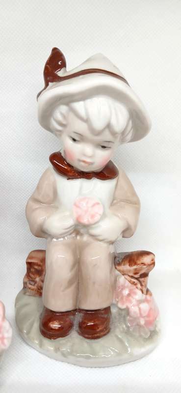 Vintage Elweco boy and girl figurines