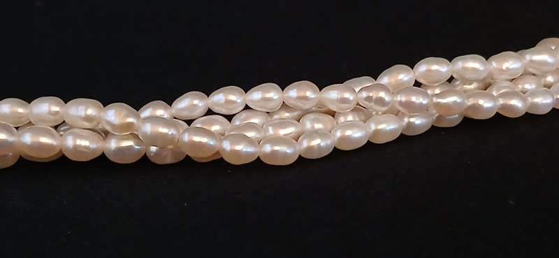 Vintage Rice pearls with 14ct gold clasp